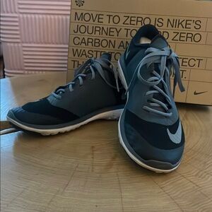 Nike Black and Gray Sneakers with Breathable Mesh and Sleek Design